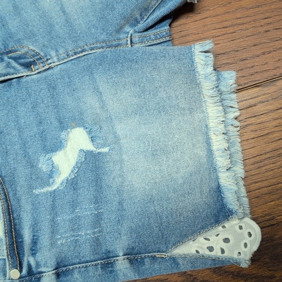Judy Blue -  Mid Rise Denim Cut Off Shorts With Eyelet Detail - Picture 4 of 6